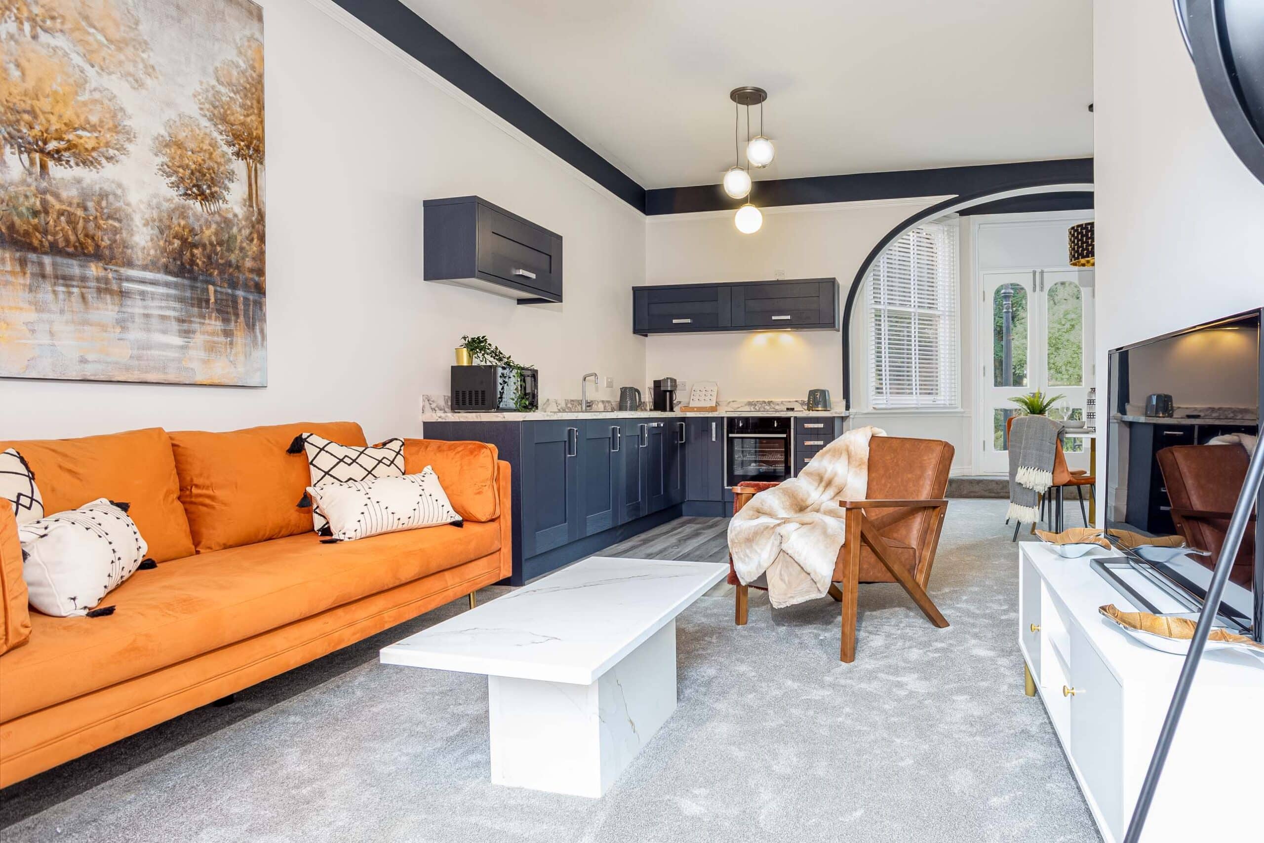 Open plan lounge and kitchen in this fully furnished two bedroom apartment in Grimsby for corporate and business travellers